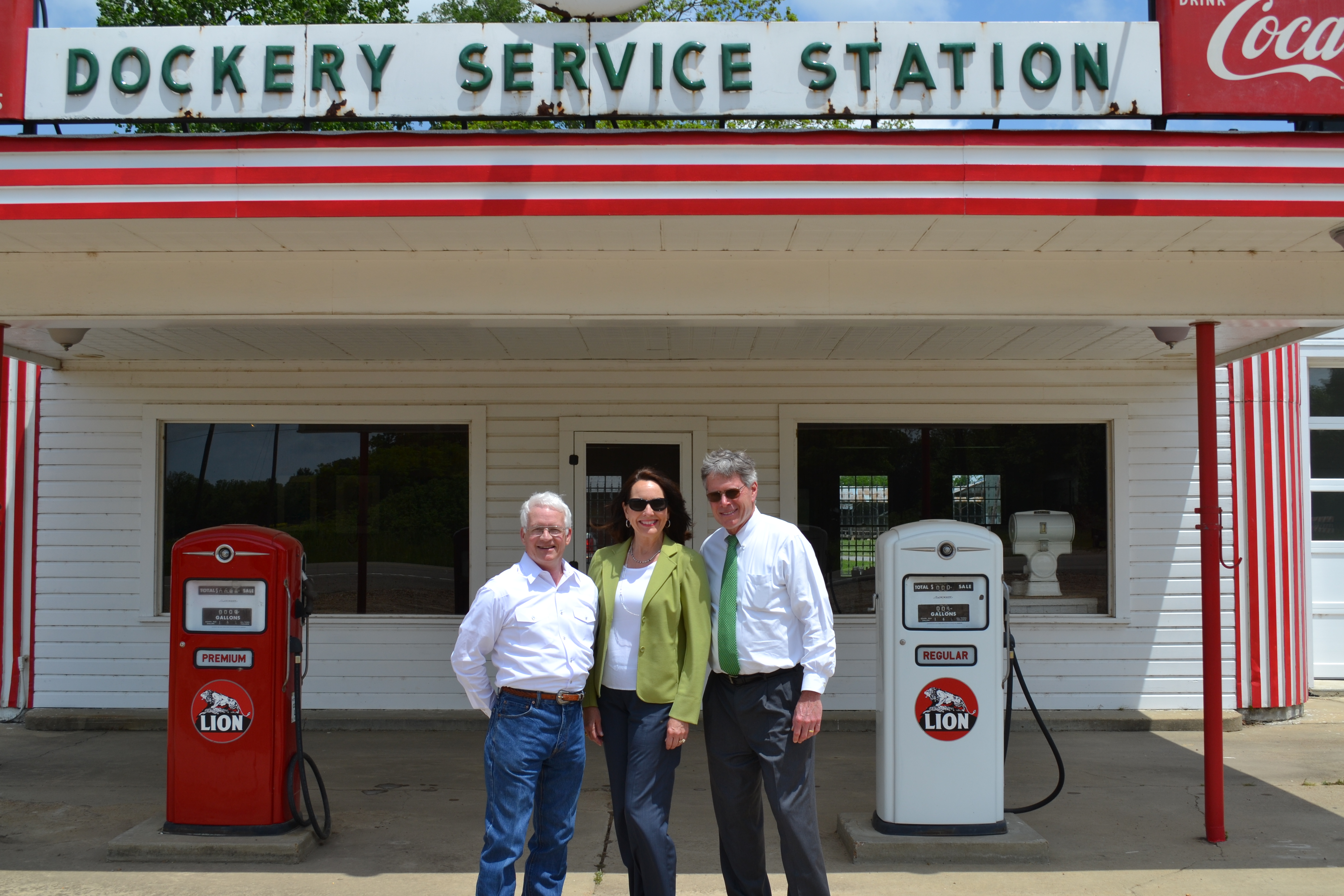  From left, Delta State Professor Emeritus of Art and Coordinator for the Dockery Farms Foundation Bill Lester, Delta State First Lady Nancy LaForge and Delta State President William N. LaForge in front of the history Dockery Service Station.